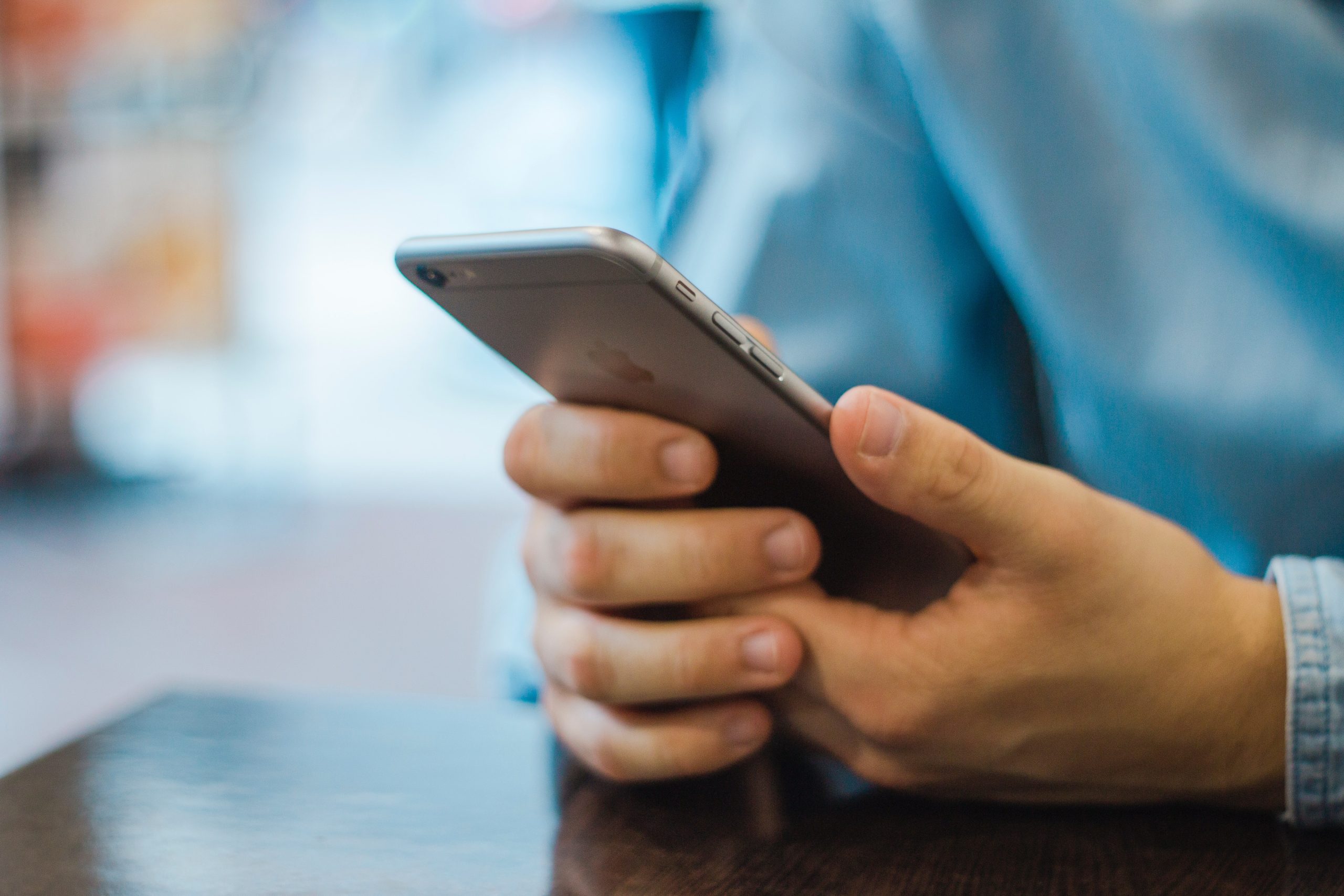 man holding mobile phone